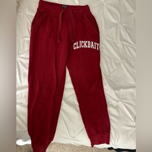 Clickbait cuffed red joggers by David Dobrik